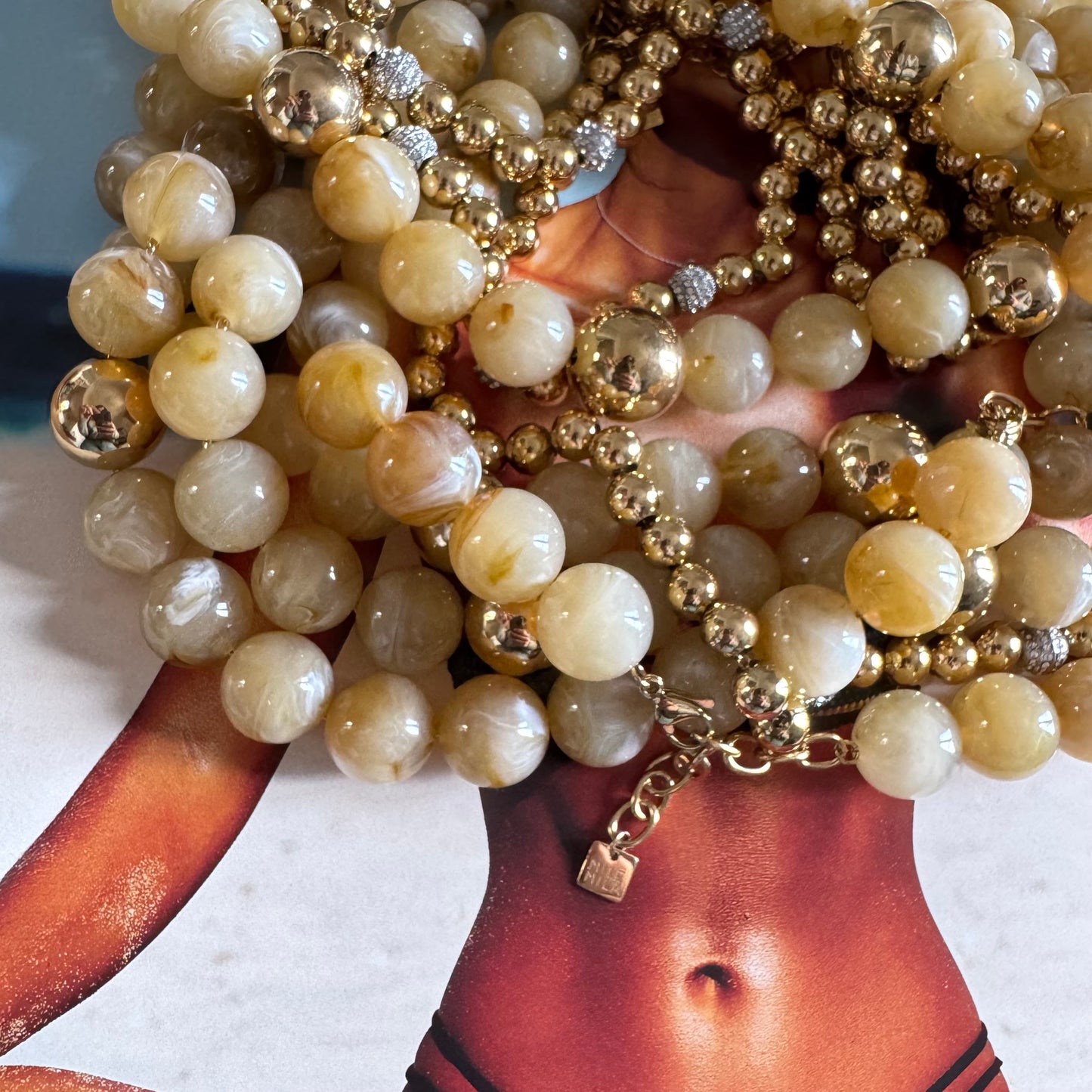 Collier boules sable