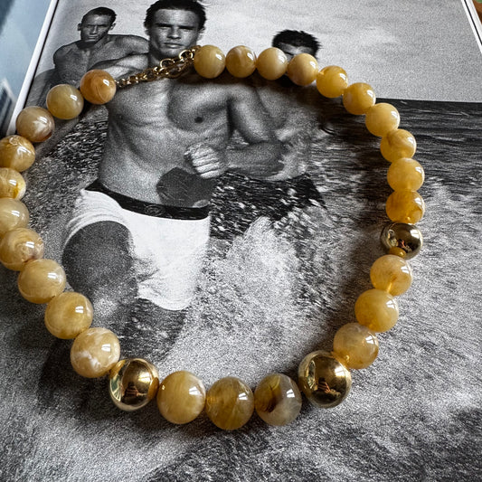 Collier boules sable